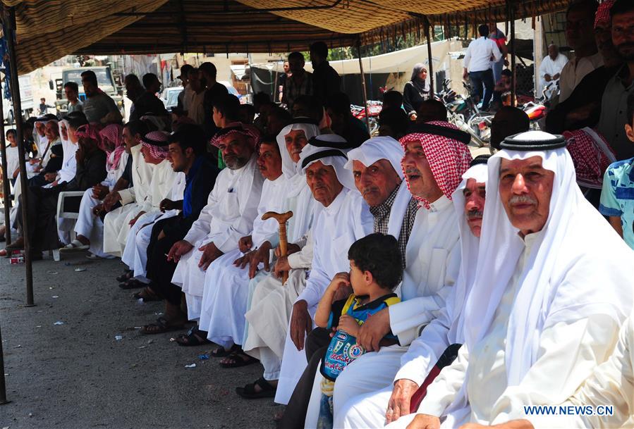 SYRIA-DARAA-PRO-GOVERNMENT-RALLY