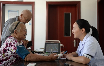 Pic story of village doctor in east China's Anhui