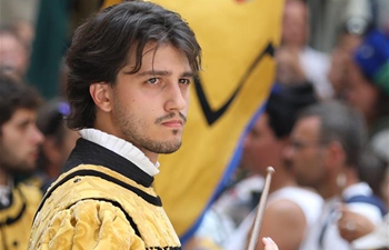 Highlights of costume parade during traditional horse race Palio in Italy