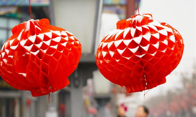 Lanterns covered by snow in Beijing on occasion of Chinese Lantern Festival