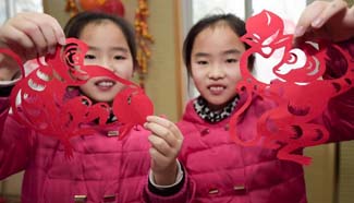 Activities held around China to greet Spring Festival