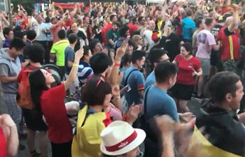 Belgian football fans celebrate dramatic win over Japan